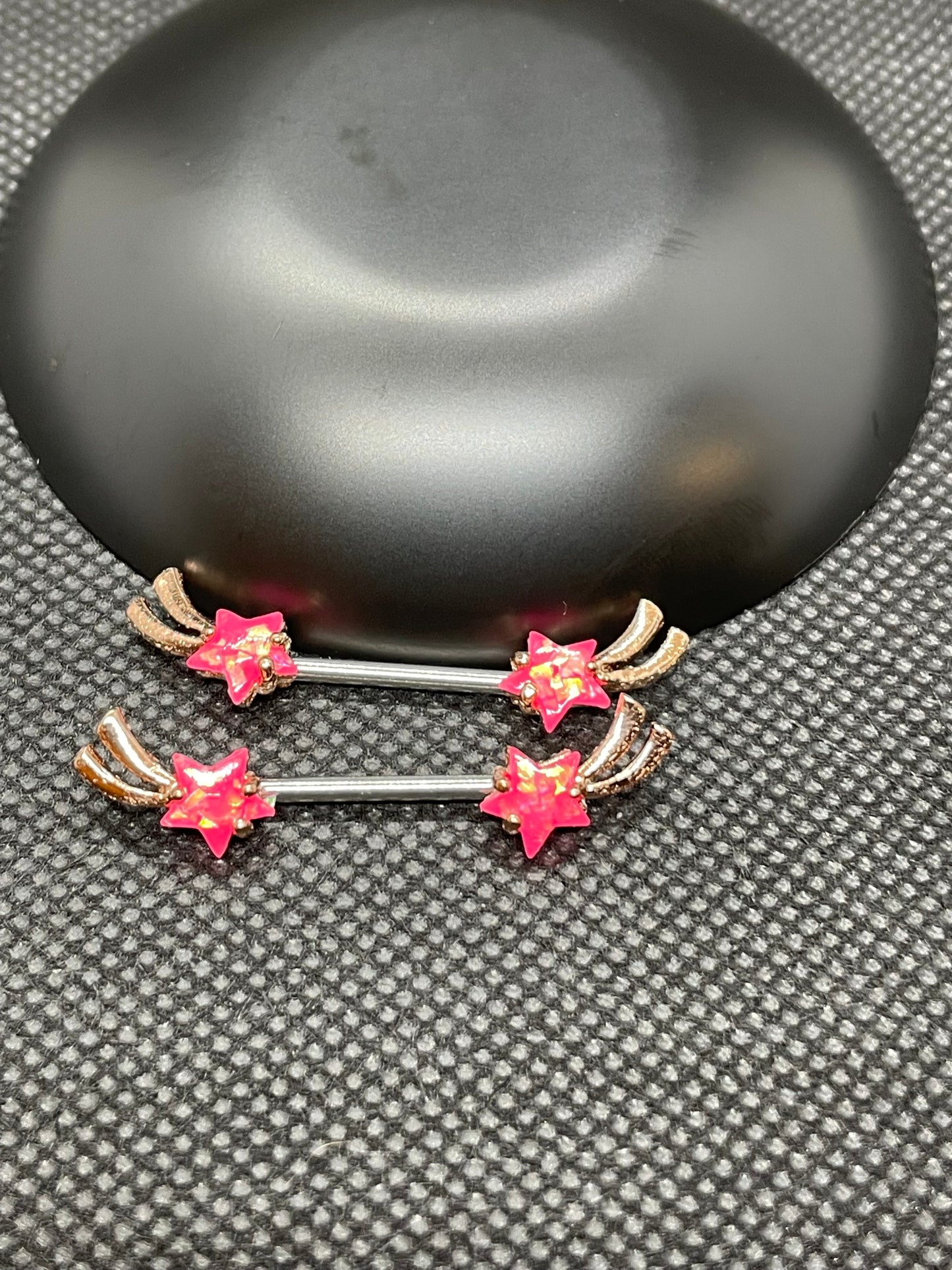 pair of shooting star nipple ring