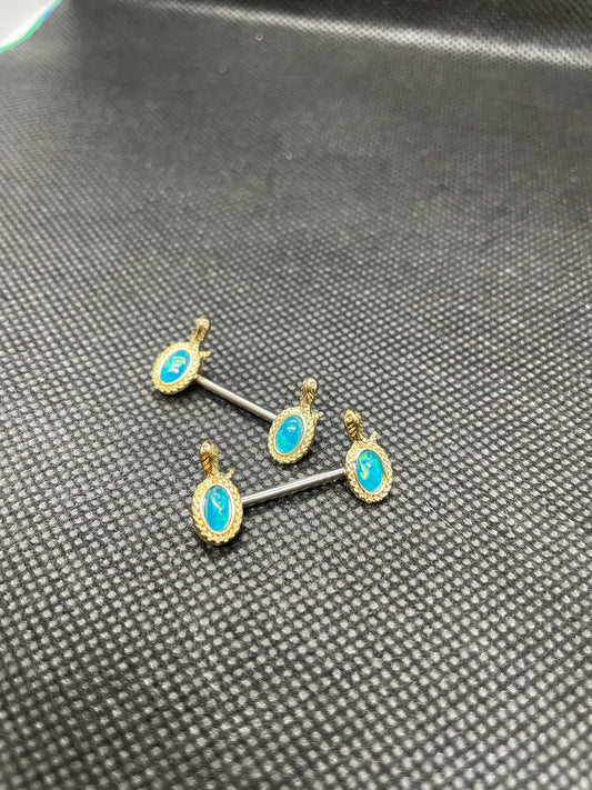 pair of oval blue nipple rings